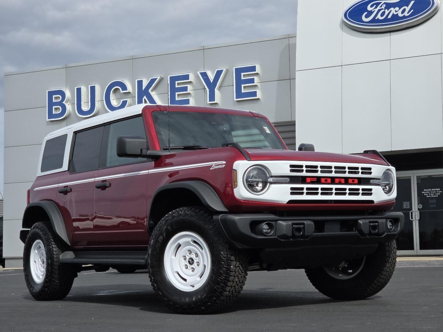 2025 Ford Bronco Heritage Edition in Ruby Red Metallic Tinted Clearcoat — front three-quarter view