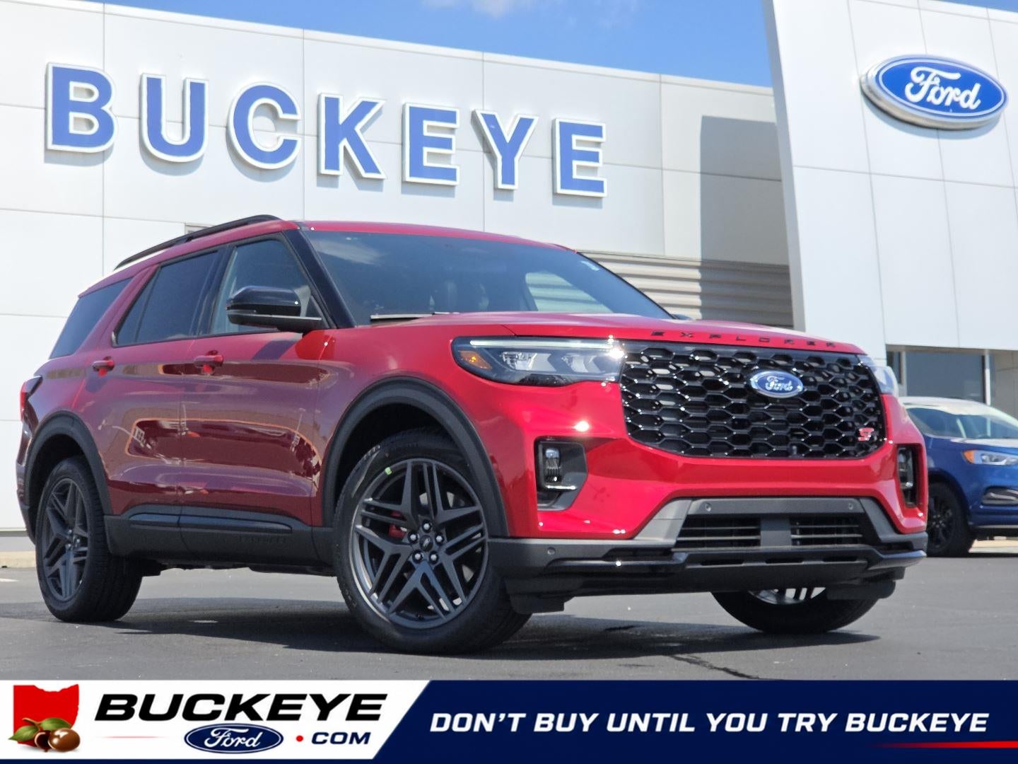 2026 Ford Explorer ST in Rapid Red Metallic Tinted Clearcoat — front three-quarter view