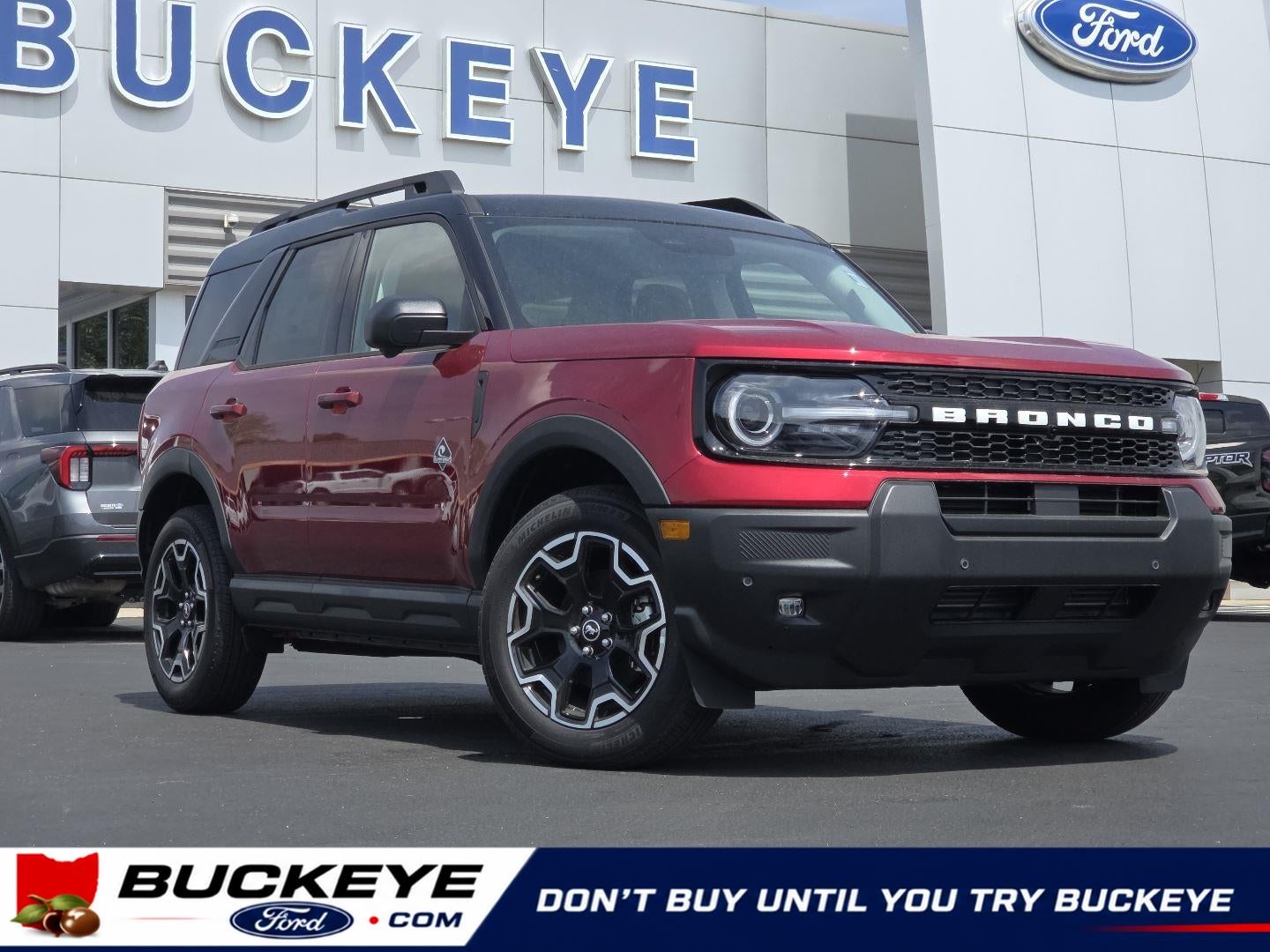 2025 Ford Bronco Sport Outer Banks in Ruby Red Metallic Tinted Clearcoat — front three-quarter view