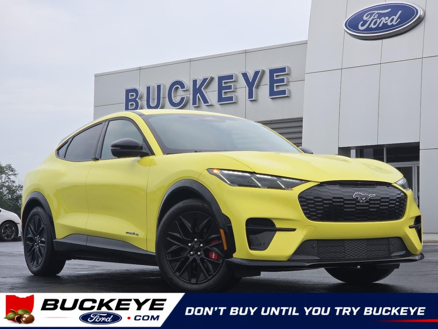 2025 Ford Mustang Mach-E Premium in Grabber Yellow — front three-quarter view